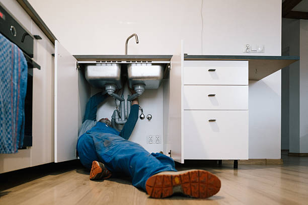 Professional Emergency Plumber technician working in Rio, VA